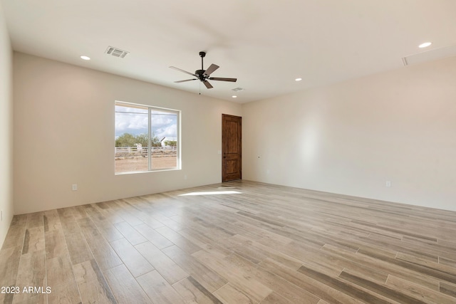48111 N 7th Ave, New River, AZ 85087 - empty room with ceiling fan and light wood-type flooring