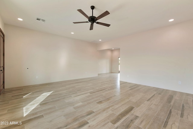 48111 N 7th Ave, New River, AZ 85087 - unfurnished room with light wood-type flooring and ceiling fan