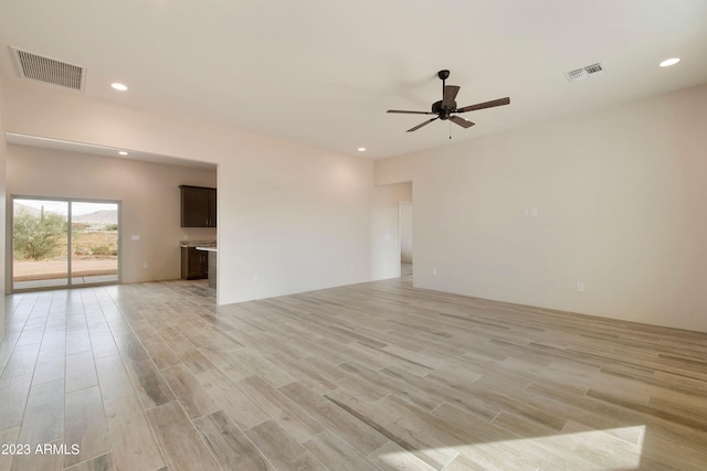 48111 N 7th Ave, New River, AZ 85087 - spare room with ceiling fan and light hardwood / wood-style floors