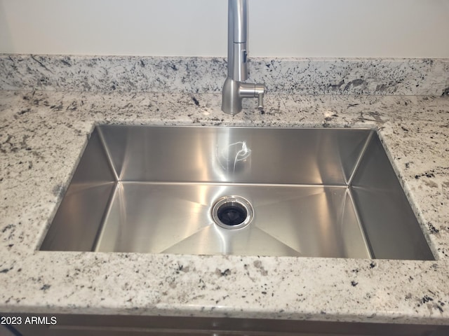 48111 N 7th Ave, New River, AZ 85087 - details featuring light stone counters and sink