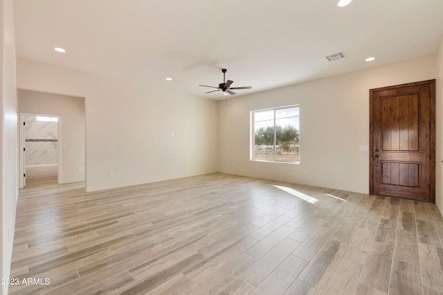 48111 N 7th Ave, New River, AZ 85087 - unfurnished room with ceiling fan and light hardwood / wood-style floors