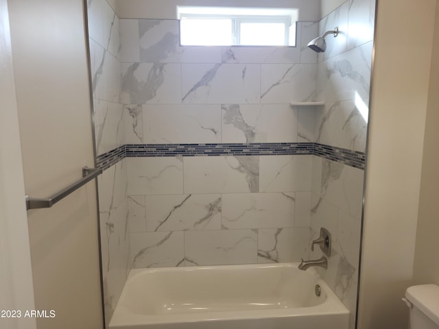 48111 N 7th Ave, New River, AZ 85087 - bathroom featuring tiled shower / bath and toilet