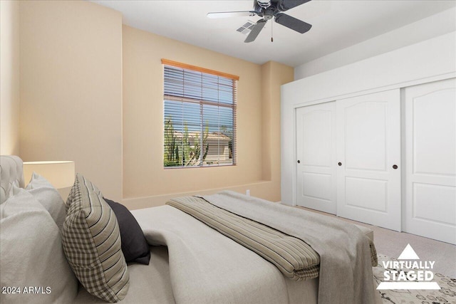 bedroom featuring a closet, ceiling fan, and carpet floors