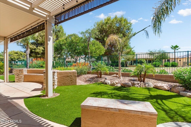 view of yard with a patio and a pergola