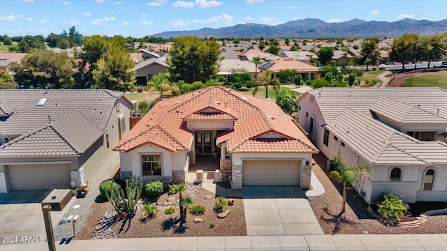 bird's eye view with a mountain view