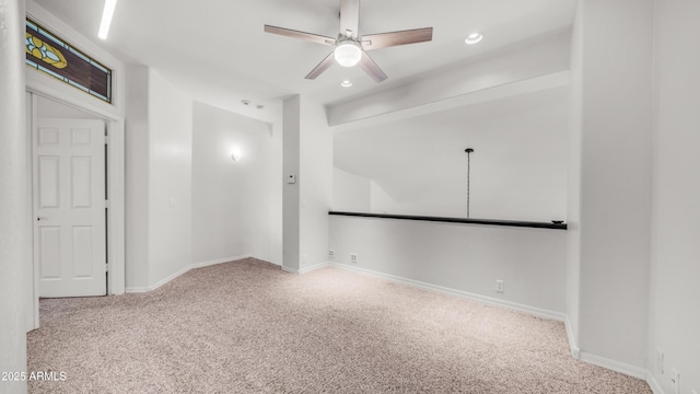 carpeted empty room with ceiling fan, recessed lighting, and baseboards