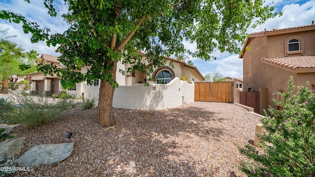 view of yard featuring a gate and fence