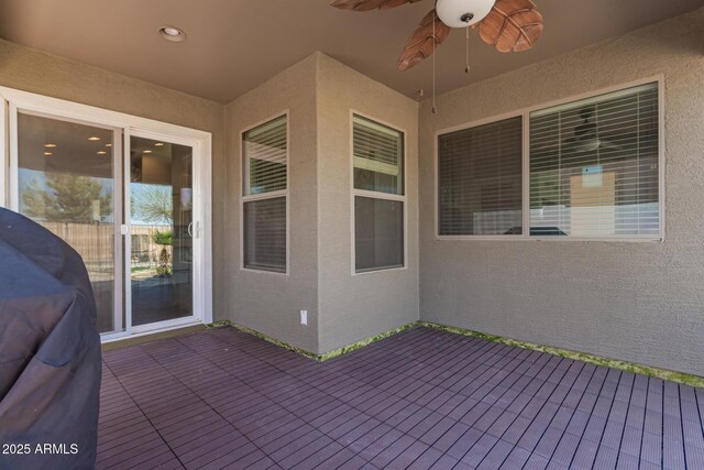 view of patio / terrace featuring a ceiling fan