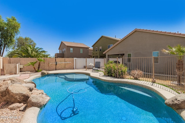 view of pool featuring a fenced backyard, a patio area, and a fenced in pool
