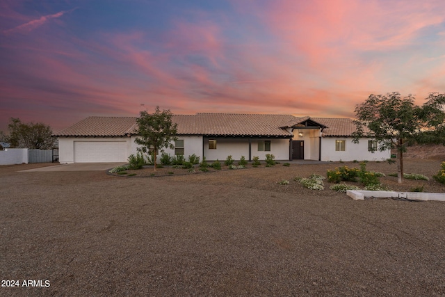 view of front of property featuring a garage