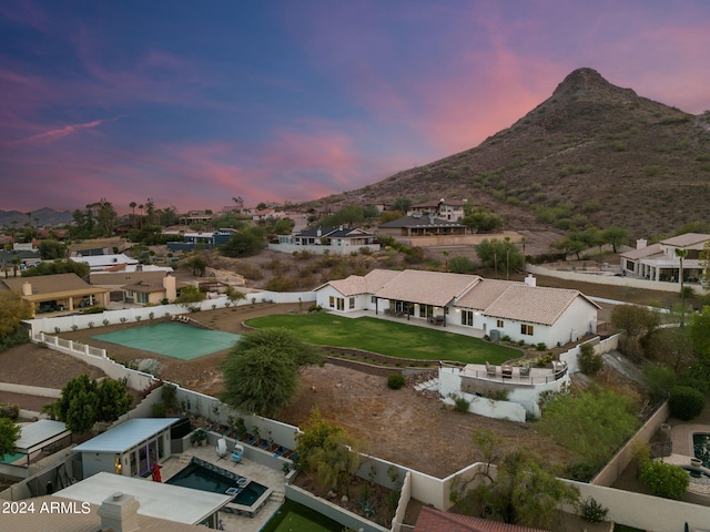 aerial view at dusk with a mountain view