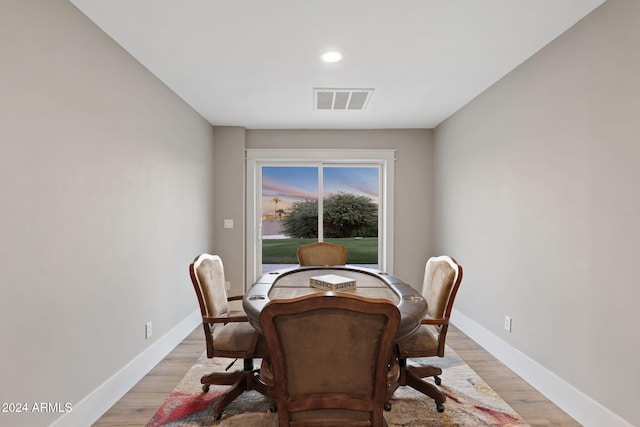 dining room with light hardwood / wood-style floors