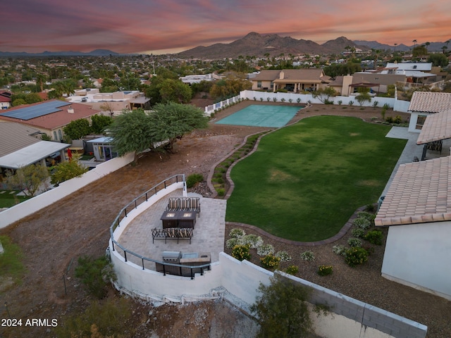 aerial view at dusk with a mountain view