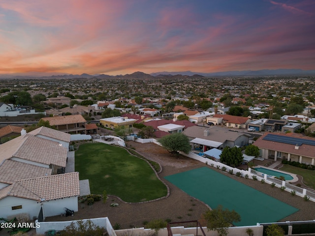 aerial view at dusk with a mountain view