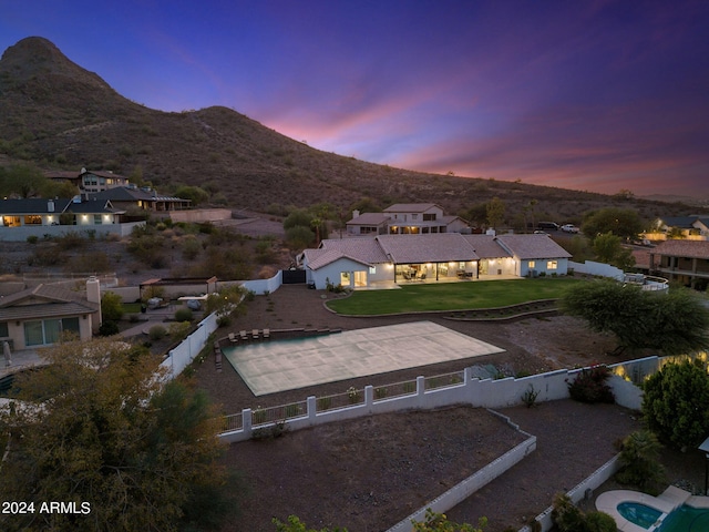 aerial view at dusk with a mountain view