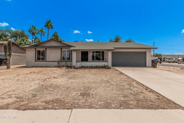 17201 N 35th Dr, Glendale, AZ 85308 - ranch-style house with a garage, driveway, and brick siding