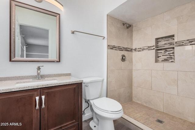 17201 N 35th Dr, Glendale, AZ 85308 - bathroom with vanity, toilet, and tiled shower