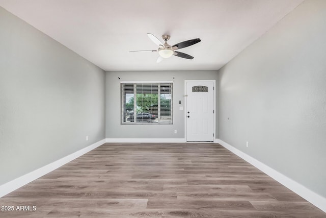 17201 N 35th Dr, Glendale, AZ 85308 - unfurnished room with ceiling fan, wood finished floors, and baseboards