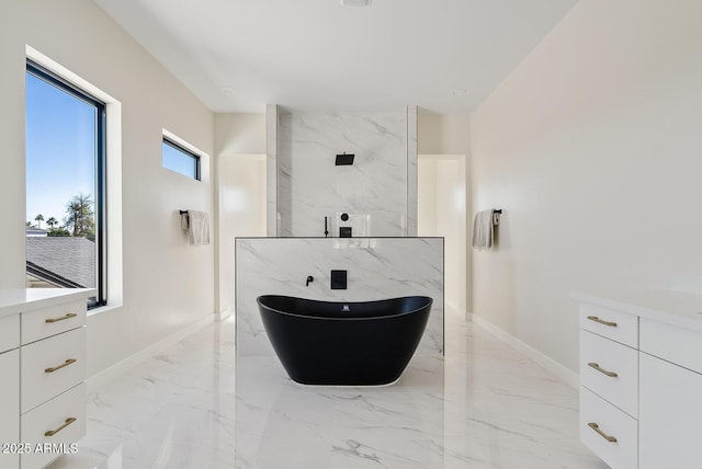 bathroom featuring vanity and shower with separate bathtub