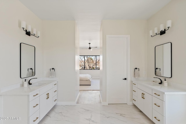 bathroom featuring vanity and ceiling fan