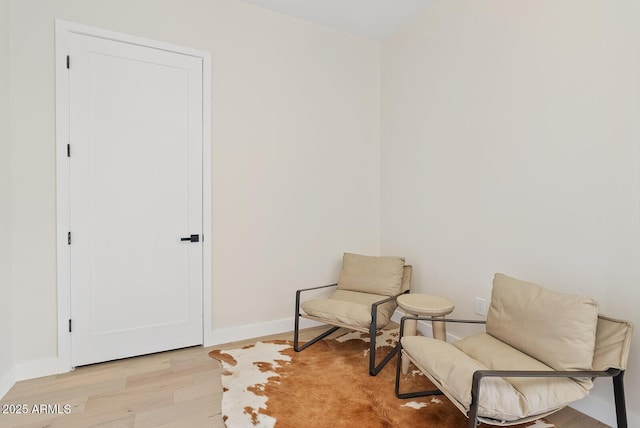 living area featuring light hardwood / wood-style floors