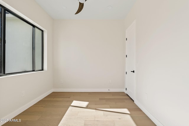 unfurnished room featuring ceiling fan and light hardwood / wood-style floors