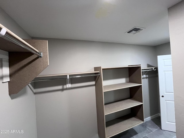 spacious closet with visible vents