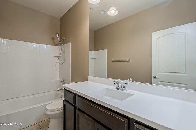 full bathroom with  shower combination, vanity, toilet, and tile patterned floors