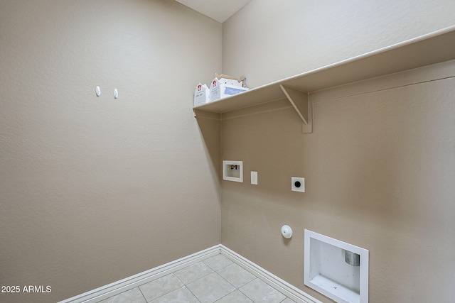 clothes washing area with laundry area, gas dryer hookup, hookup for a washing machine, hookup for an electric dryer, and light tile patterned flooring