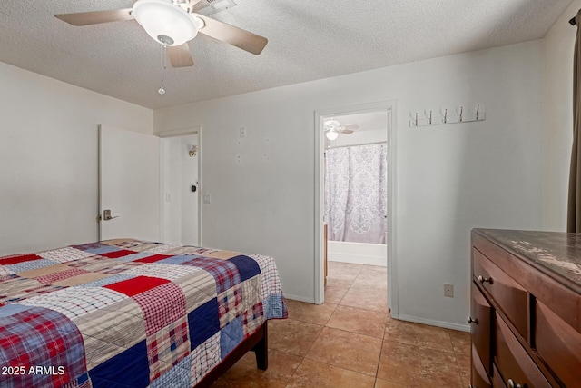 bedroom featuring baseboards, a textured ceiling, ceiling fan, and light tile patterned floors
