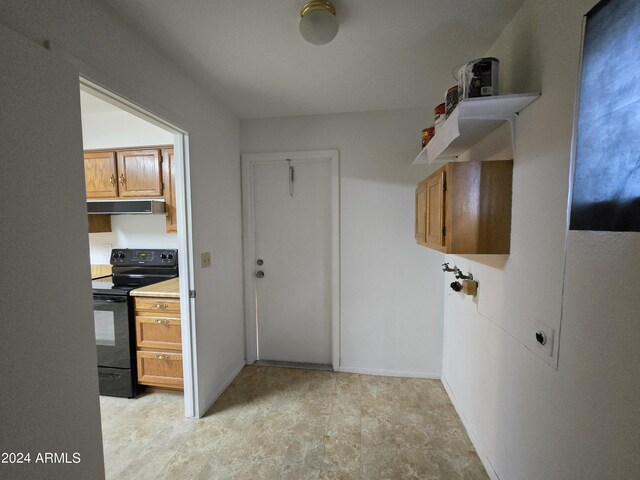 washroom with electric dryer hookup and hookup for a washing machine