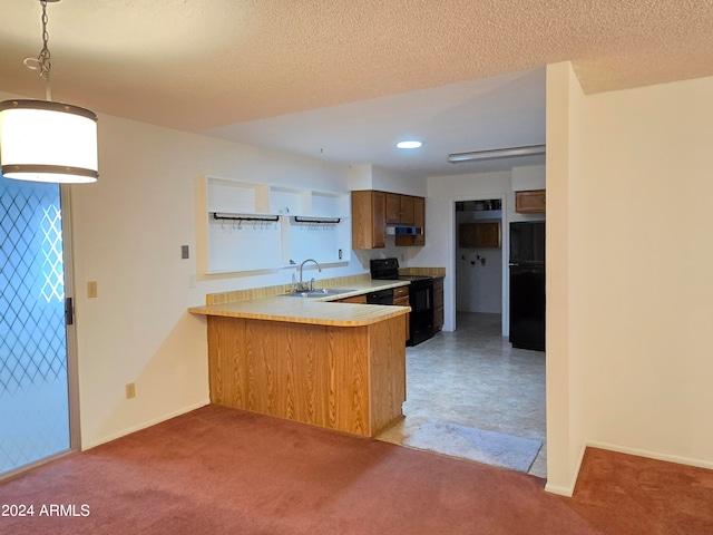 kitchen featuring kitchen peninsula, light colored carpet, sink, black appliances, and hanging light fixtures