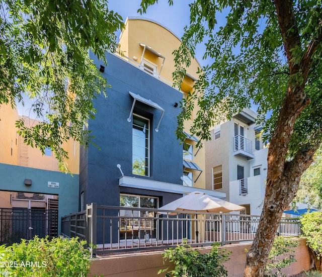 706 E Washington St Unit 124, Phoenix, AZ 85034 - back of property featuring stucco siding