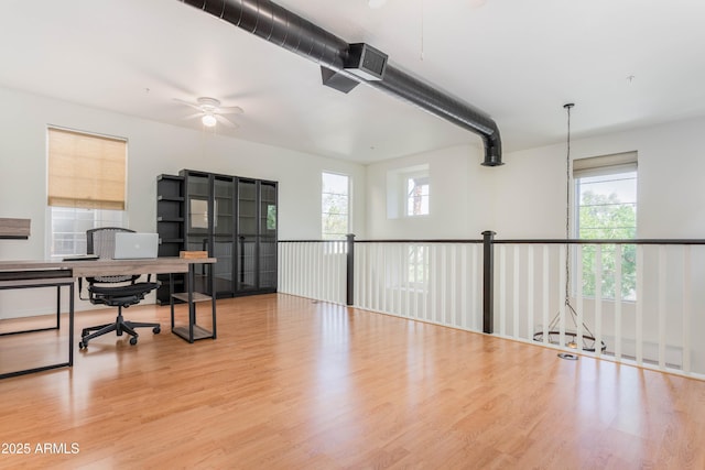 706 E Washington St Unit 124, Phoenix, AZ 85034 - office featuring a ceiling fan, plenty of natural light, and wood finished floors