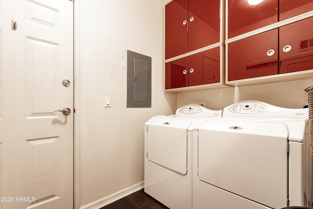 706 E Washington St Unit 124, Phoenix, AZ 85034 - washroom featuring electric panel, cabinet space, and separate washer and dryer