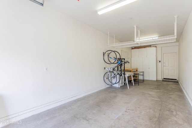 706 E Washington St Unit 124, Phoenix, AZ 85034 - garage featuring baseboards