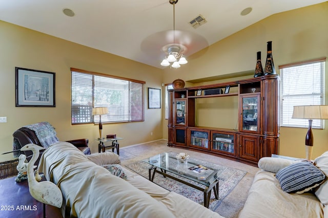 7815 S 22nd Ln, Phoenix, AZ 85041 - carpeted living room with lofted ceiling and ceiling fan