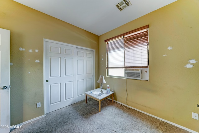 7815 S 22nd Ln, Phoenix, AZ 85041 - bedroom with carpet floors, cooling unit, baseboards, and a closet