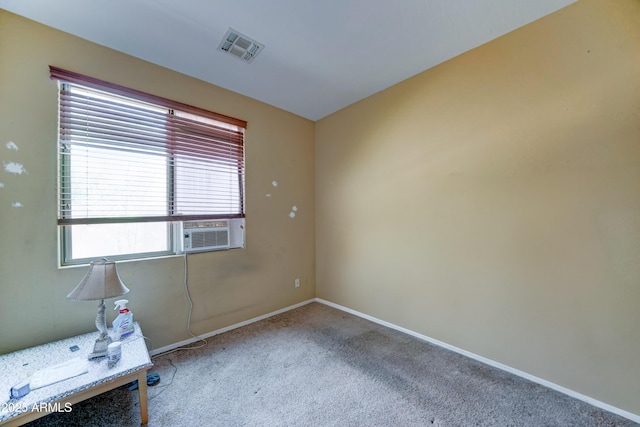 7815 S 22nd Ln, Phoenix, AZ 85041 - carpeted empty room with baseboards and cooling unit