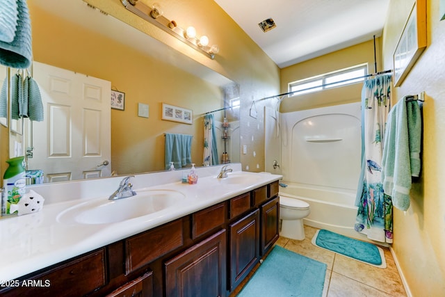 7815 S 22nd Ln, Phoenix, AZ 85041 - full bathroom featuring shower / bath combination with curtain, toilet, double vanity, and tile patterned floors