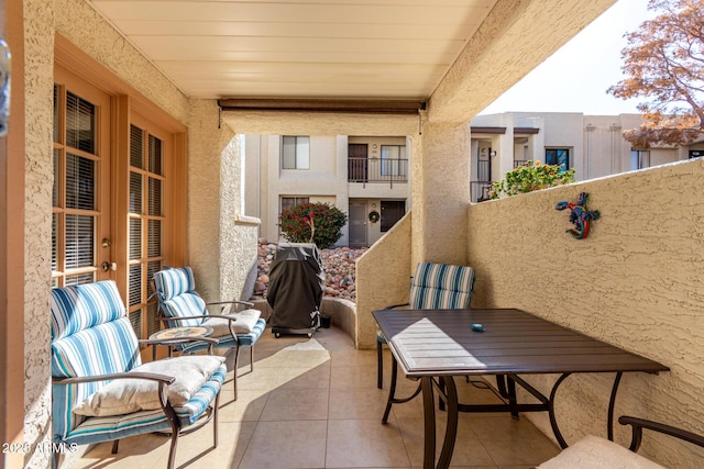 balcony featuring a grill