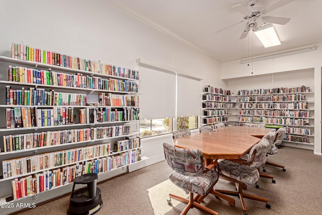 home office featuring ceiling fan and carpet flooring