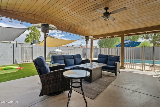 view of patio / terrace featuring an outdoor hangout area and ceiling fan