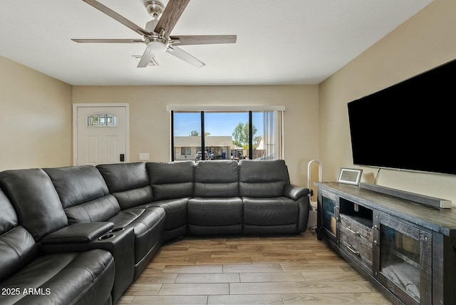 living room with ceiling fan