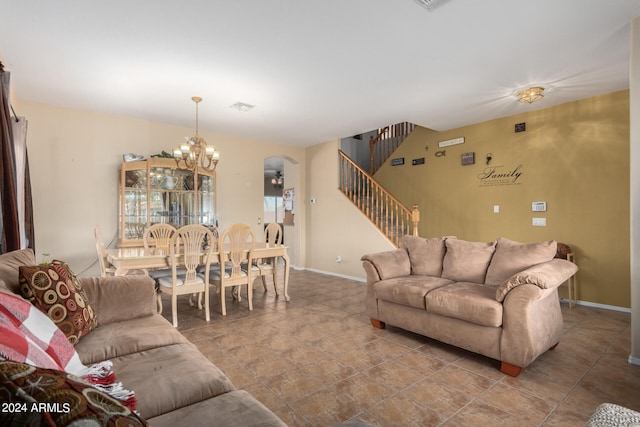 living room featuring an inviting chandelier