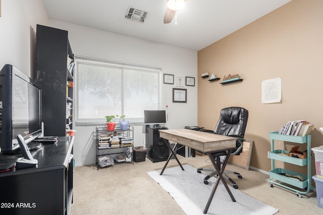 carpeted office with ceiling fan