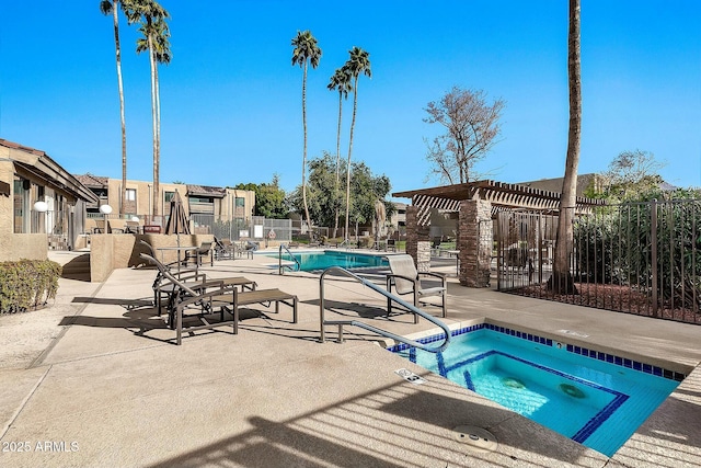 view of swimming pool with a community hot tub, a pergola, and a patio