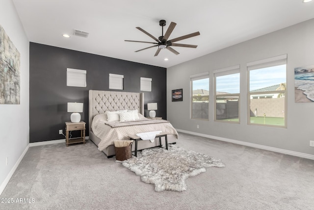 carpeted bedroom with ceiling fan