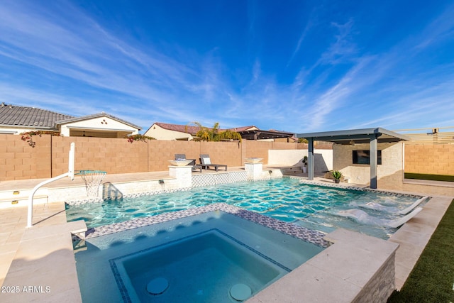 view of pool with an in ground hot tub