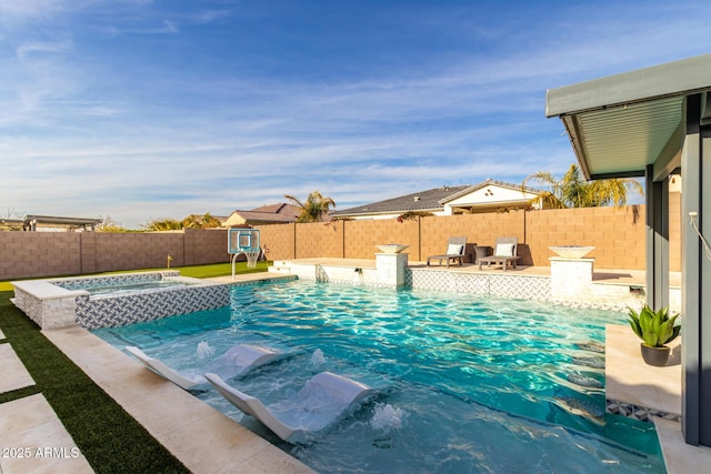 view of pool with an in ground hot tub and pool water feature